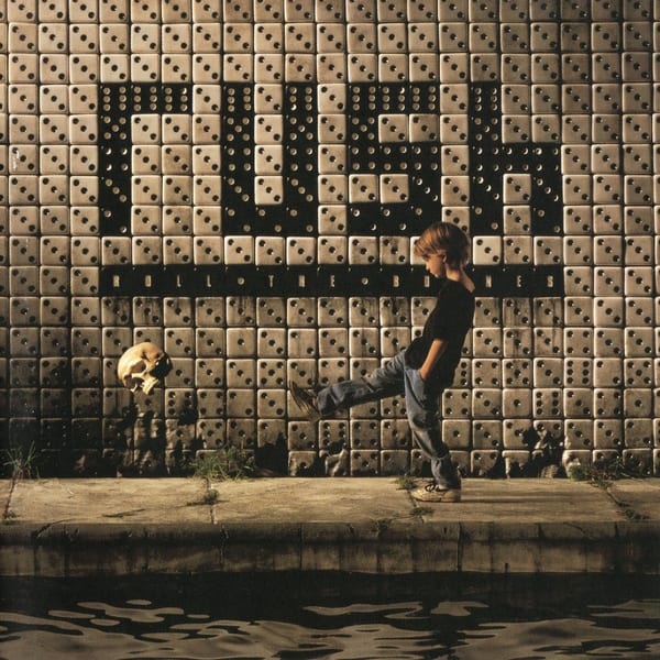 Roll the Bones by Rush, album cover